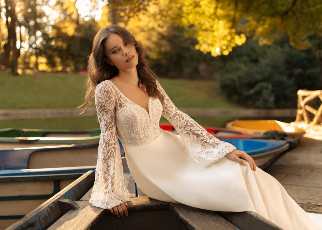 Floral wedding dress with long sleeves by Libelle Bridal